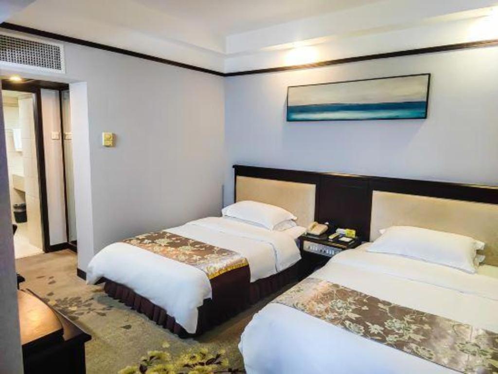 Overseas Chinese Hotel Джухай Екстериор снимка